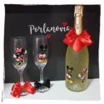 Botella dorada decorada Mickey y Minnie con lazo rojo