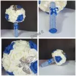 Ramo de novia rosas marfil y azul con broche mariposa