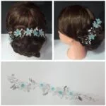 Tocado de novia con flores azules y hojas plateadas