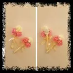 Prendido de novio con rositas en coral y crema