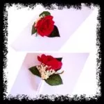 Prendido de novio con rosa roja y hojas verdes