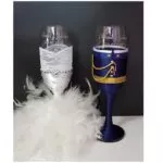 Copas novios azul marino purpurina con plumas blancas y encaje