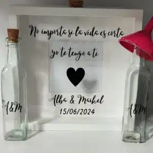 Cuadro ceremonia de la arena con frase romántica y diseño de corazón.