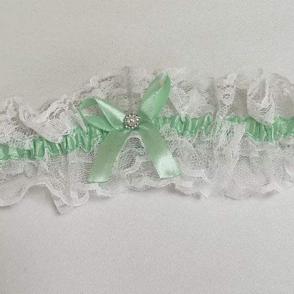 Liga de novia verde agua con encaje blanco y lazo