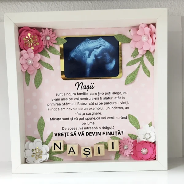 cuadro para pedir padrinos con ecografía del bebé y flores decorativas en tonos rosa